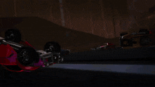 a blue car is driving down a road with a sign that says ' rocket league ' on it