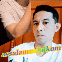 a man in a white shirt with the word assalamualaikum on the bottom