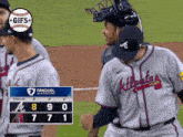 atlanta braves baseball players celebrate a win in the finals