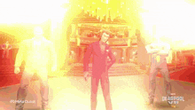 a man in a red suit is standing in front of a chandelier in a video game called deadpool