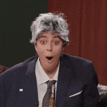 a man with a surprised look on his face and the words oh my god above him