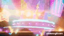 a person is standing on a stage in front of a neon sign that says make a gif .