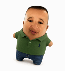 a baby wearing a green polo shirt with a blue horse on it