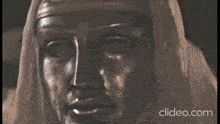 a close up of a person 's face with a blurry background
