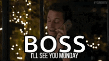 a man is talking on a cell phone with the words boss i 'll see you monday behind him .