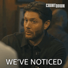 a man with a beard says we 've noticed in front of a countdown logo