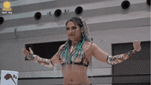 a woman in a wrestling ring with the hashtag #pw_mg