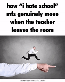 a hand pointing at a man running in the air .