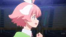 a girl with pink hair and white ears stands in front of a building