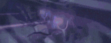 a close up of a robot with a purple light on it 's head .