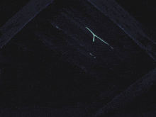 a close up of a person 's eyes with a few stars behind them