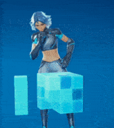 a woman with a shield on her chest is holding a cube