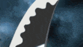 a close up of a blade of a sword