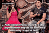 a man and a woman are sitting next to each other and the woman is talking into a microphone .