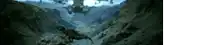 a dinosaur is walking through a canyon with a reflection of a building in the water .