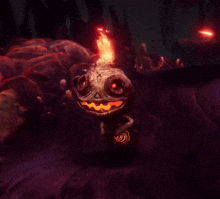 a skull with a flame coming out of it 's mouth