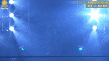 a woman in a crop top and shorts is dancing in front of a sign that says fpw mg