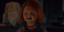 a close up of a child 's play doll making a funny face .