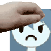 a hand is reaching for a cartoon character 's face .