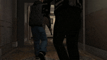 a man in a black and white jacket says " fuck calm nathan has skill issue " in a hallway
