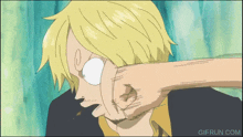 a gif from gifrun.com shows a man getting a fist to the face