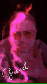 a picture of a man with the name guswel written on the bottom