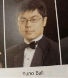a man in a tuxedo and bow tie is named yuno ball