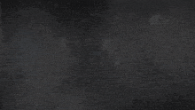 a dark background with the words little nightmares written in white