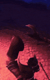 a person in a video game is standing on a cobblestone floor .