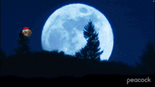 a person riding a bike in front of a full moon
