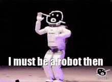a robot is dancing with the words i must be a robot then below it