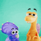 a purple dinosaur and a yellow dinosaur are standing next to each other on a green background