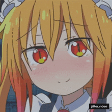 a close up of a girl 's face with jitter.video in the bottom right corner