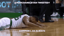 a basketball player is laying on the floor with a caption that says " common l as always "