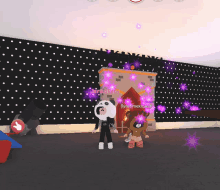 a girl in a panda costume is standing next to a teddy bear in front of a fireplace with purple lights