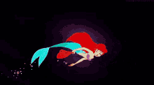 a pixel art of a mermaid with bubbles in the background