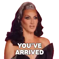 a drag queen says you 've arrived in a black dress