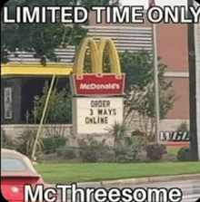 a picture of a mcdonald 's sign that says limited time only mcthreesome