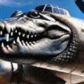 a painting of a crocodile 's head on the side of a plane