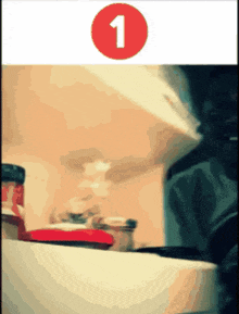 a red circle with the number 1 in the middle