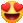a smiley face with heart shaped eyes and a smile .