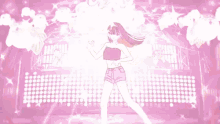 a girl is dancing on a stage in front of a purple background with chinese writing