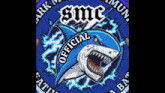 a logo with a shark and the words official smc on it