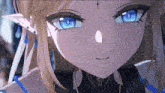 a close up of a girl 's face with blue eyes and a cross on her forehead