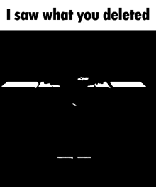 a black and white image of a building with the words `` i saw what you deleted '' written on it .