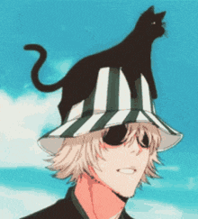 a man wearing a striped hat has a black cat on his head