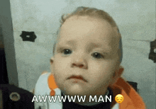 a baby is making a sad face and the words awwwwww man are above it
