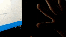 a blurry picture of a computer screen with a blue stripe