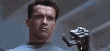 The Terminator Arnold Schwarzenegger GIF - The Terminator Arnold Schwarzenegger Fuck You GIFs