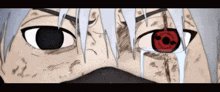 a close up of a person 's face with a red eye